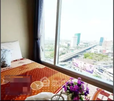 Stunning bedroom with panoramic city view and elegant decor