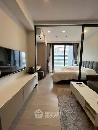 Modern bedroom with balcony view in stylish apartment