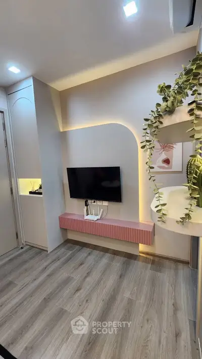 Modern living room with stylish TV setup and elegant decor