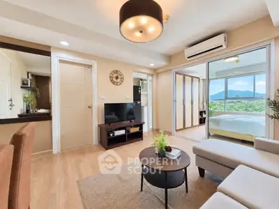 Modern living room with open layout and scenic view in stylish apartment