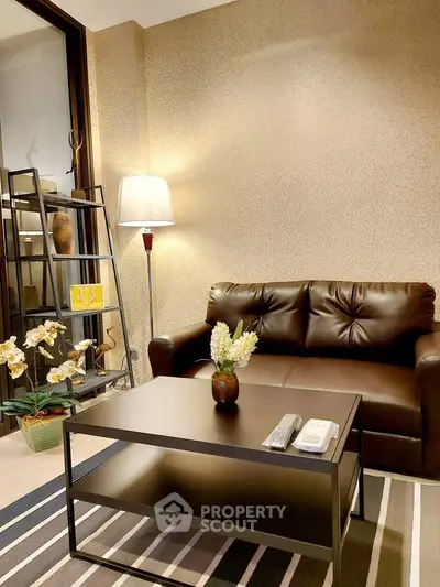 Cozy living room with leather sofa and modern decor