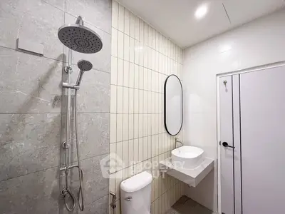 Modern bathroom with sleek shower and elegant sink design