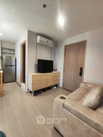 Modern living room with air conditioning and stylish furniture in a cozy apartment.