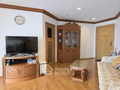 Charming living room with wooden furniture and elegant decor in cozy apartment