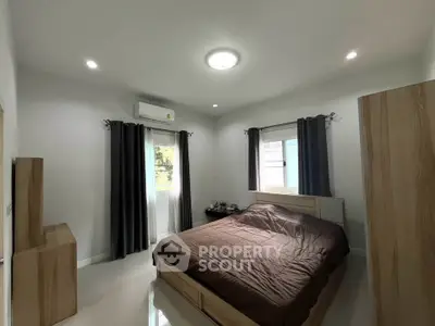 Modern bedroom with sleek design and natural light