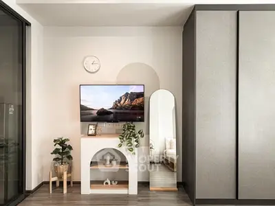 Modern living room with sleek TV setup and stylish decor