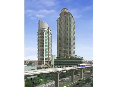 Stunning modern high-rise buildings with sleek design and panoramic city views.