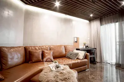 Luxurious living room with leather sofa and modern decor