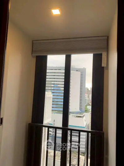 Modern apartment balcony with city view and sleek design