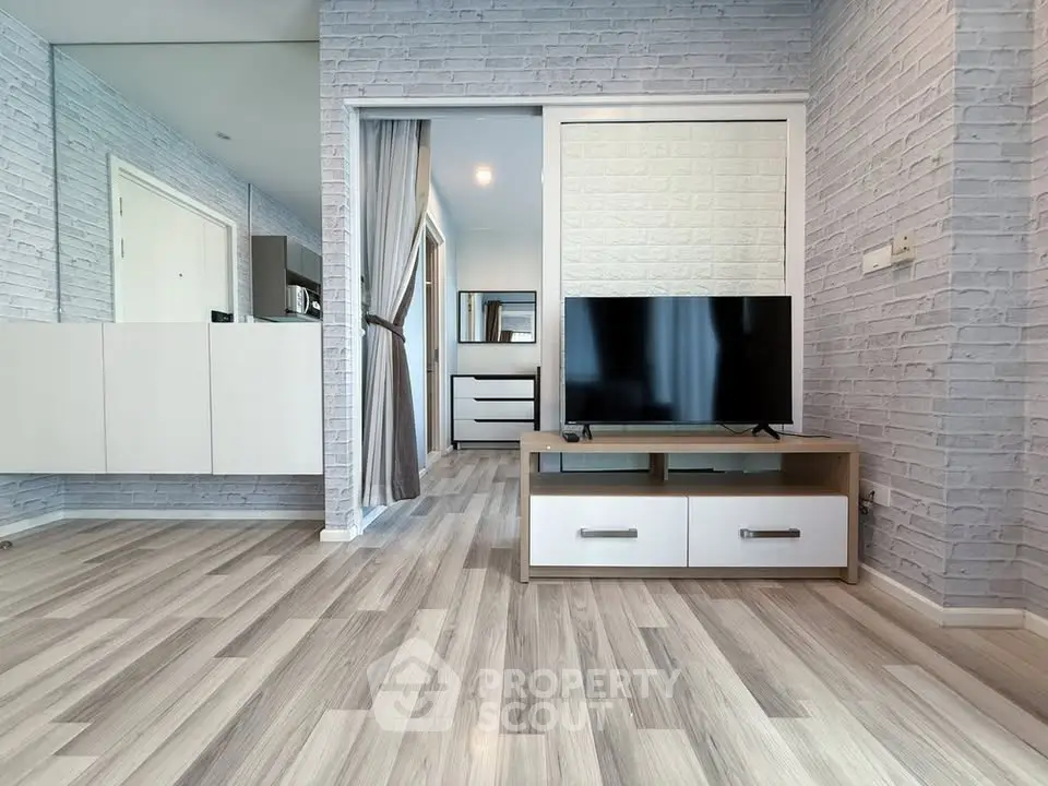 Modern living room with stylish decor and sleek TV setup