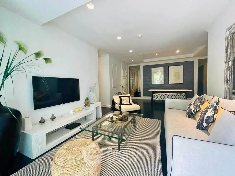 Spacious modern living room with stylish decor and natural light