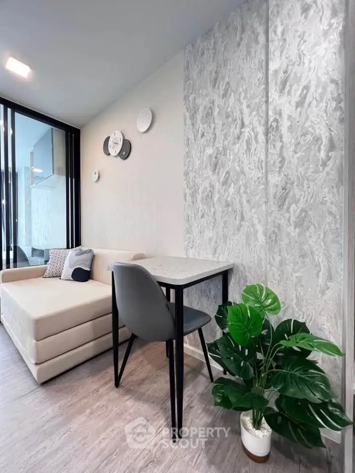 Modern living room with stylish decor and cozy seating area