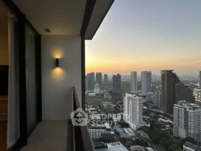 Stunning high-rise balcony view of city skyline at sunset
