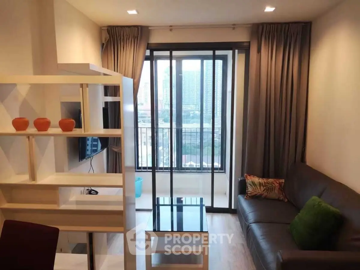 Modern living room with balcony view in urban apartment