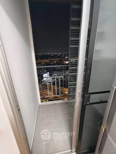 Stunning night view from a high-rise balcony overlooking city lights, perfect for urban living.