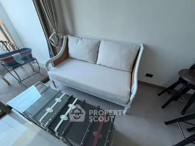 Chic living room with stylish sofa and unique trunk coffee table in modern apartment