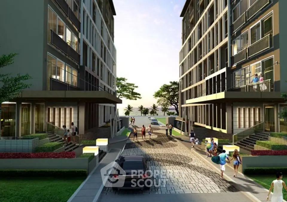 Modern residential complex with lush landscaping and ocean view