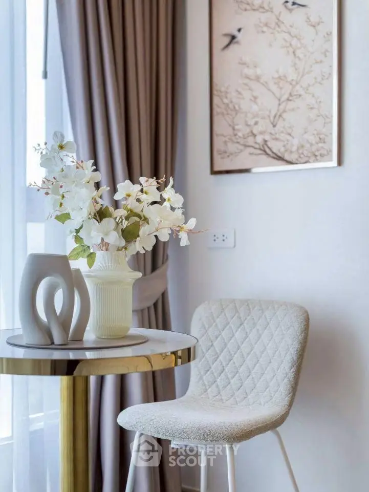 Elegant modern interior with stylish chair and table, perfect for cozy living spaces.