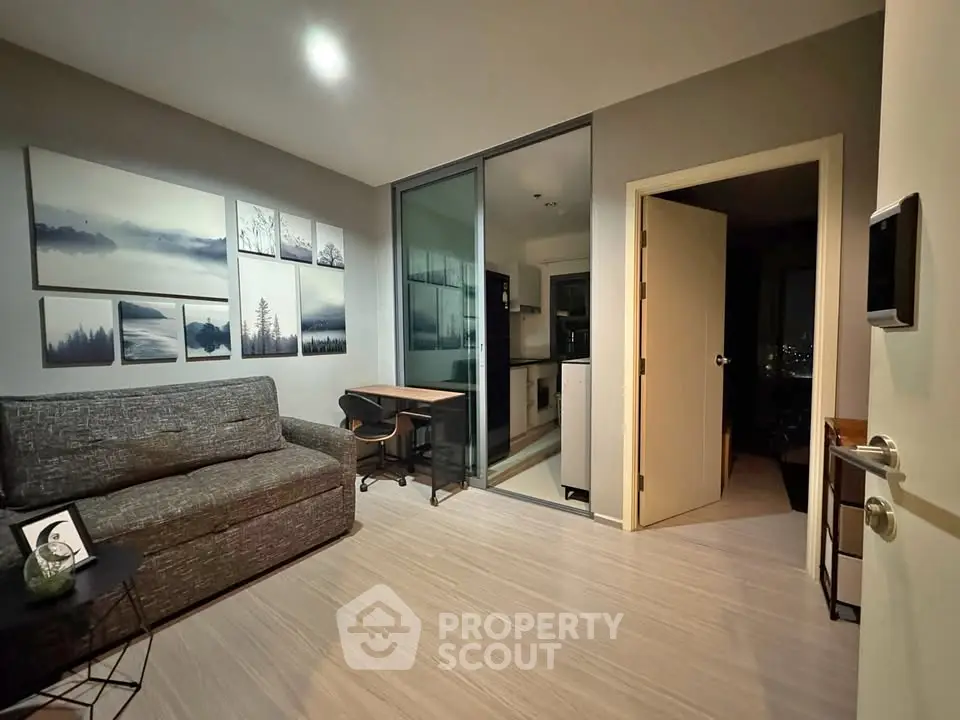 Modern living room with stylish decor and open kitchen layout