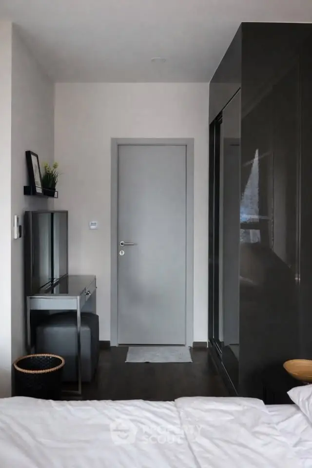 Modern bedroom with sleek furniture and minimalist decor