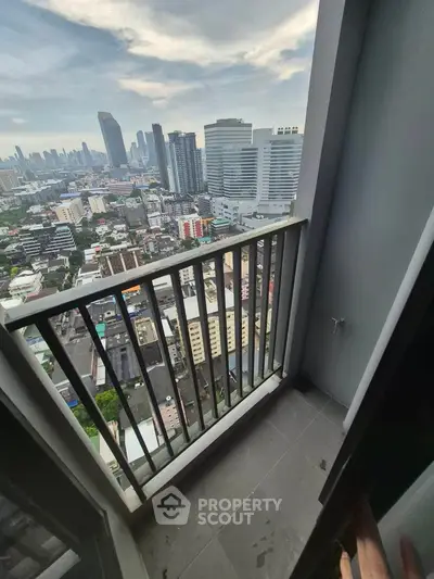 Stunning cityscape view from a high-rise balcony, perfect for urban living enthusiasts.