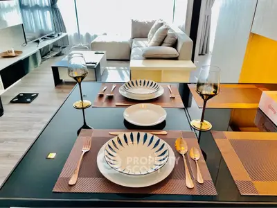Modern living room with elegant dining setup and stylish furniture
