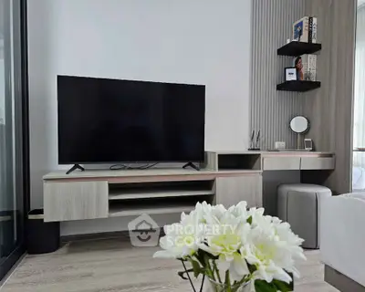 Modern living room with sleek TV setup and stylish decor