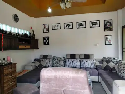 Cozy living room with stylish sectional sofa and wall art