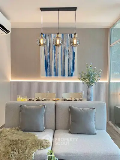 Modern living room with elegant lighting and stylish decor