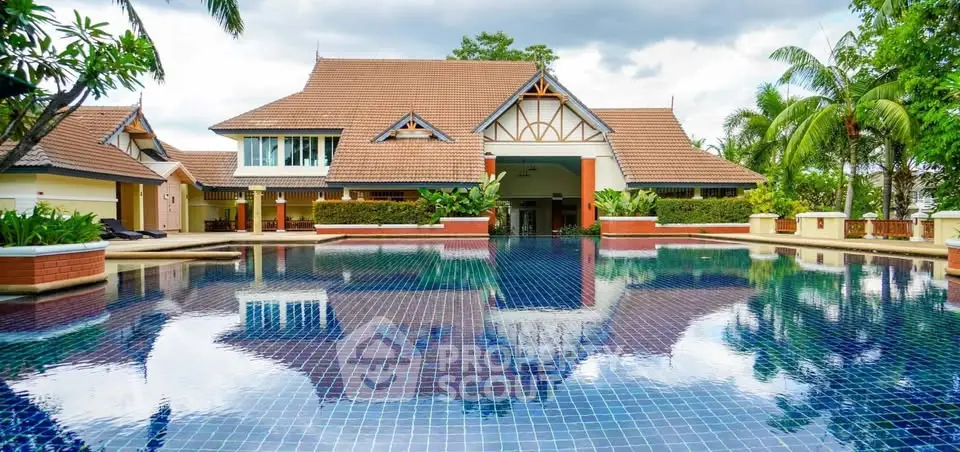 Luxurious villa with stunning pool and tropical landscaping