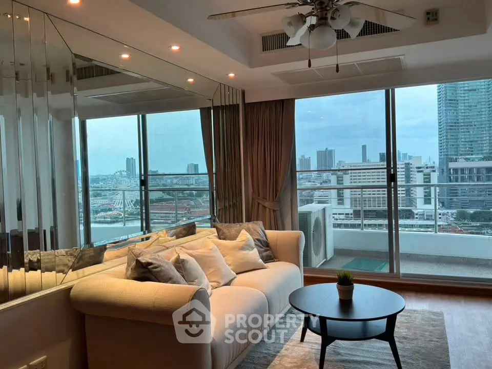 Luxurious living room with city view and elegant decor in high-rise apartment