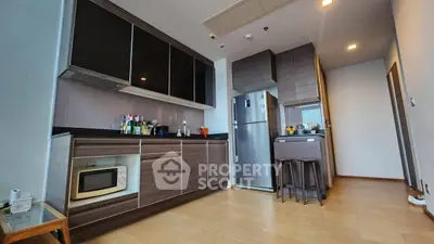 Modern kitchen with sleek cabinets and stainless steel appliances