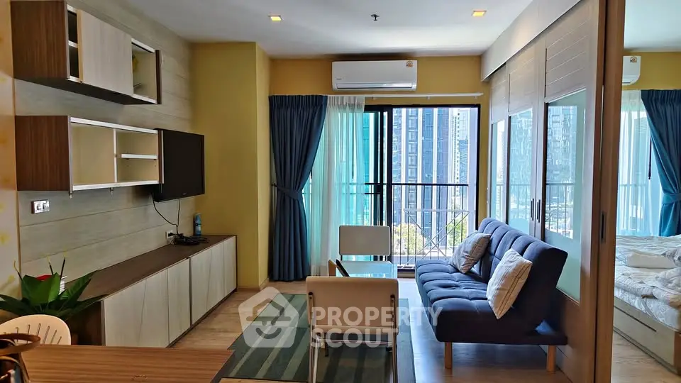 Modern living room with balcony view in stylish apartment