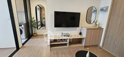 Modern living room with sleek TV setup and stylish decor