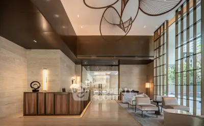 Luxurious modern building entrance with elegant decor and high ceilings