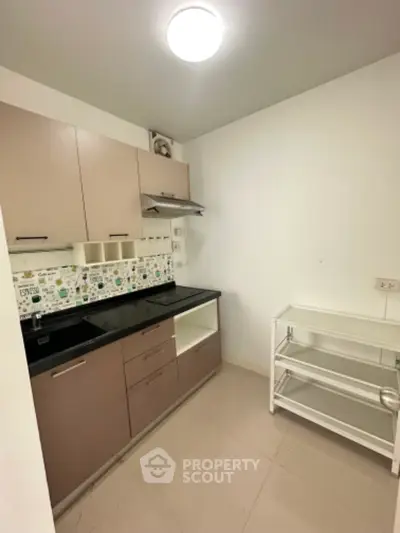 Modern kitchen with sleek cabinets and ample storage space