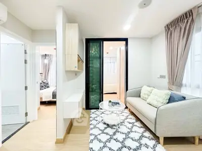 Modern living room with cozy sofa and stylish decor