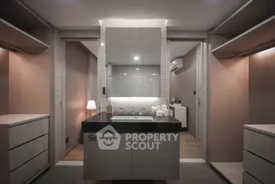 Luxurious modern bathroom with sleek vanity and ambient lighting