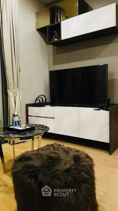 Modern living room with stylish TV unit and cozy decor