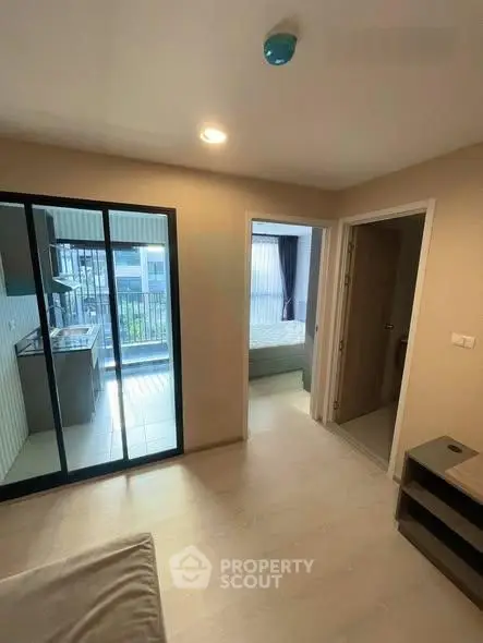 Modern apartment interior with open layout and balcony view