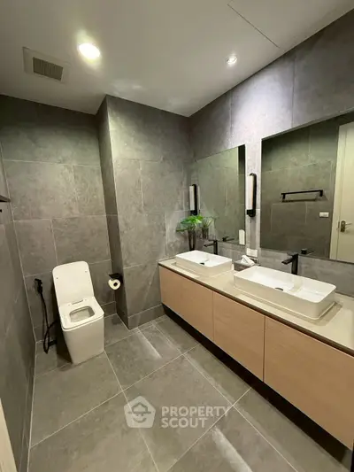 Modern bathroom with dual sinks and sleek design