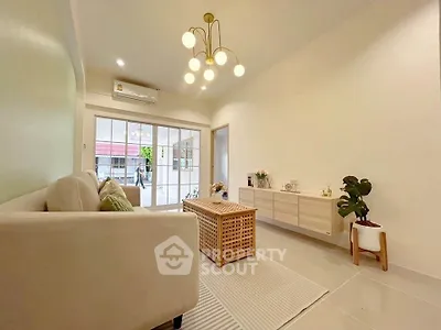 Modern living room with elegant lighting and stylish decor