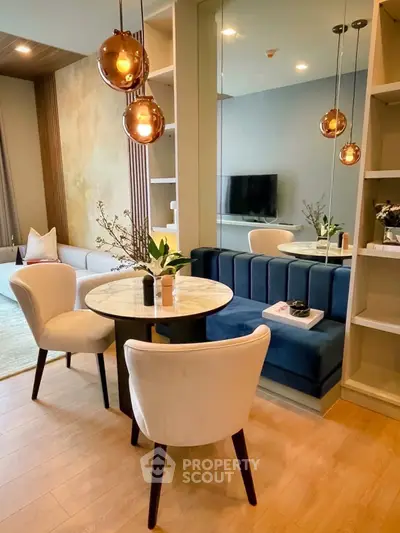 Stylish modern living room with elegant dining area and chic lighting