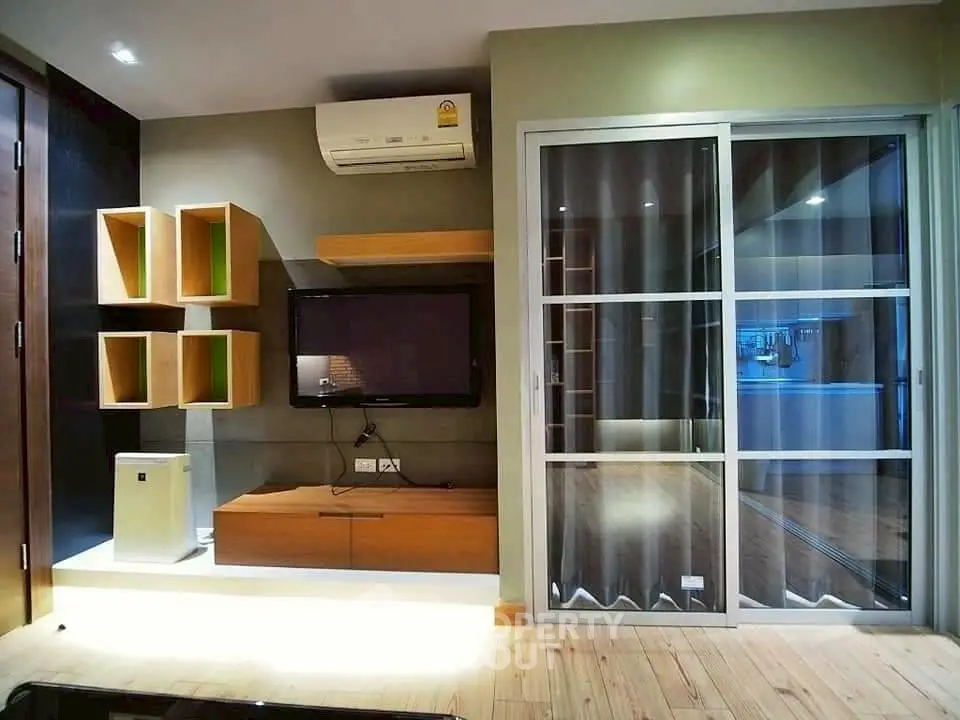 Modern living room with sleek design and air conditioning unit