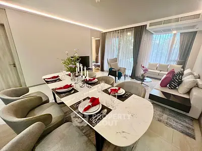 Luxurious modern living room with elegant dining area and stylish decor