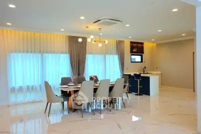 Luxurious dining area with elegant lighting and modern decor