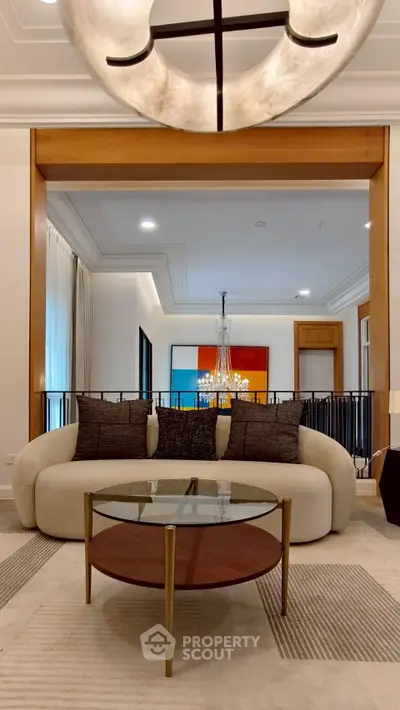 Luxurious living room with modern sofa and elegant chandelier