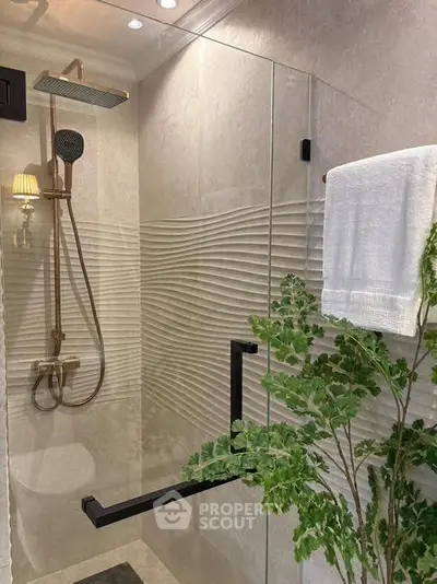 Elegant bathroom with modern shower and stylish decor