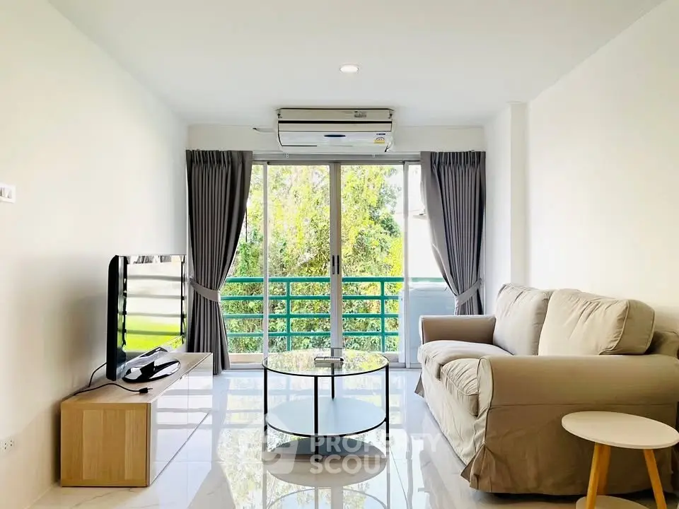 Bright and modern living room with large windows and cozy furniture