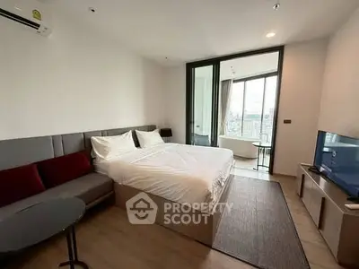 Modern bedroom with city view and stylish decor